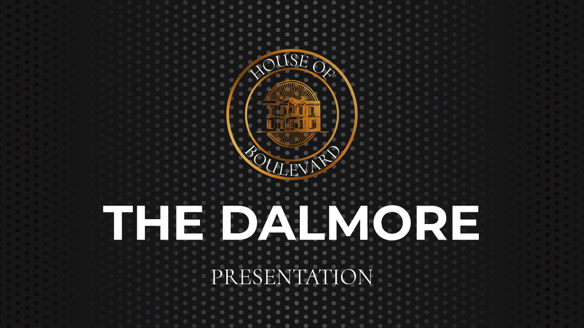 Dalmore Highland single malt Scotch whisky bottle in cinematic luxury setting with rich amber tones