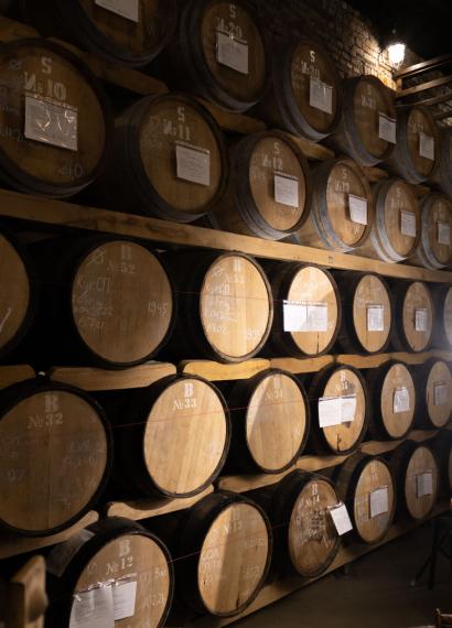 whisky casks ageing warehouse long term storage rows